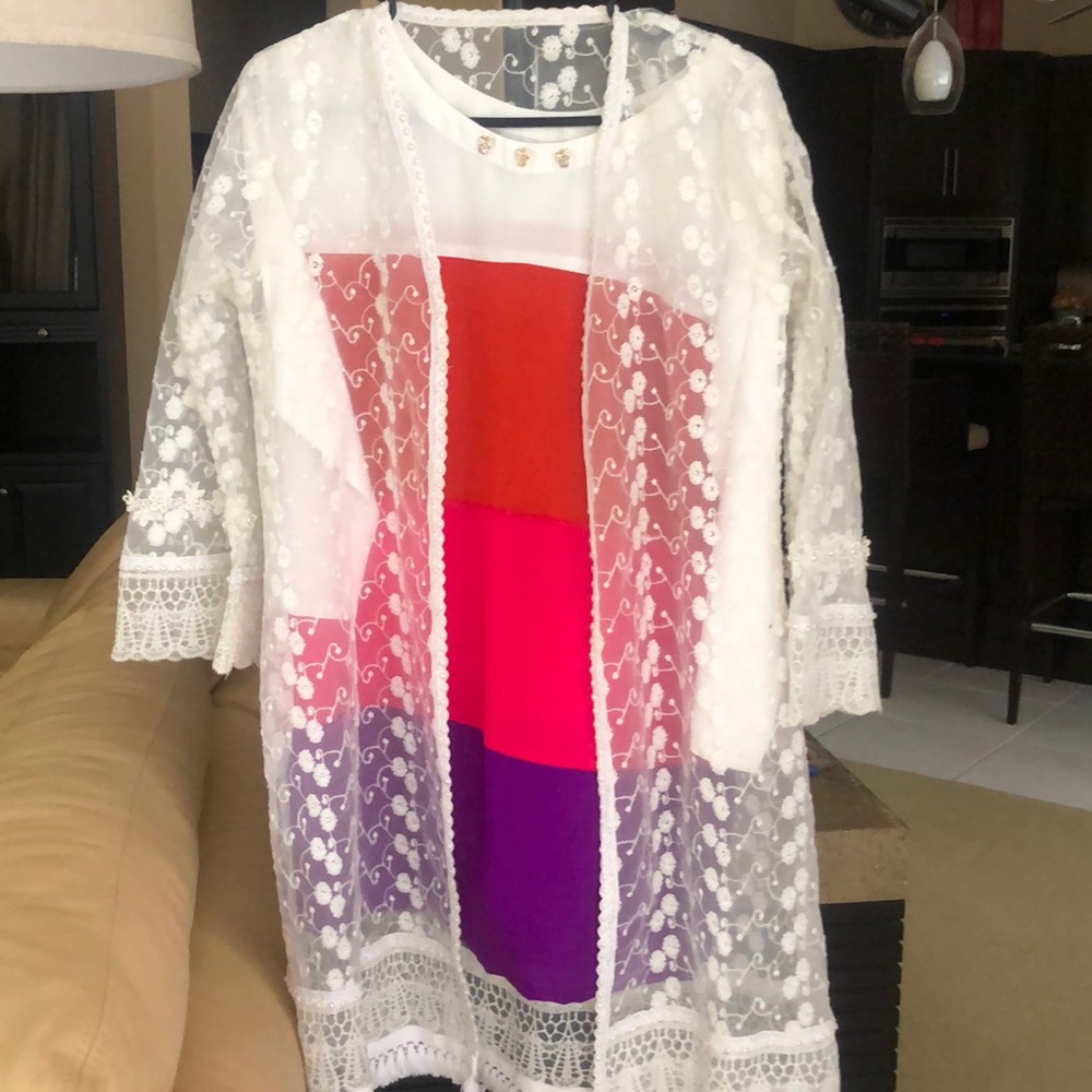Beautiful white jacket with colorful inner.